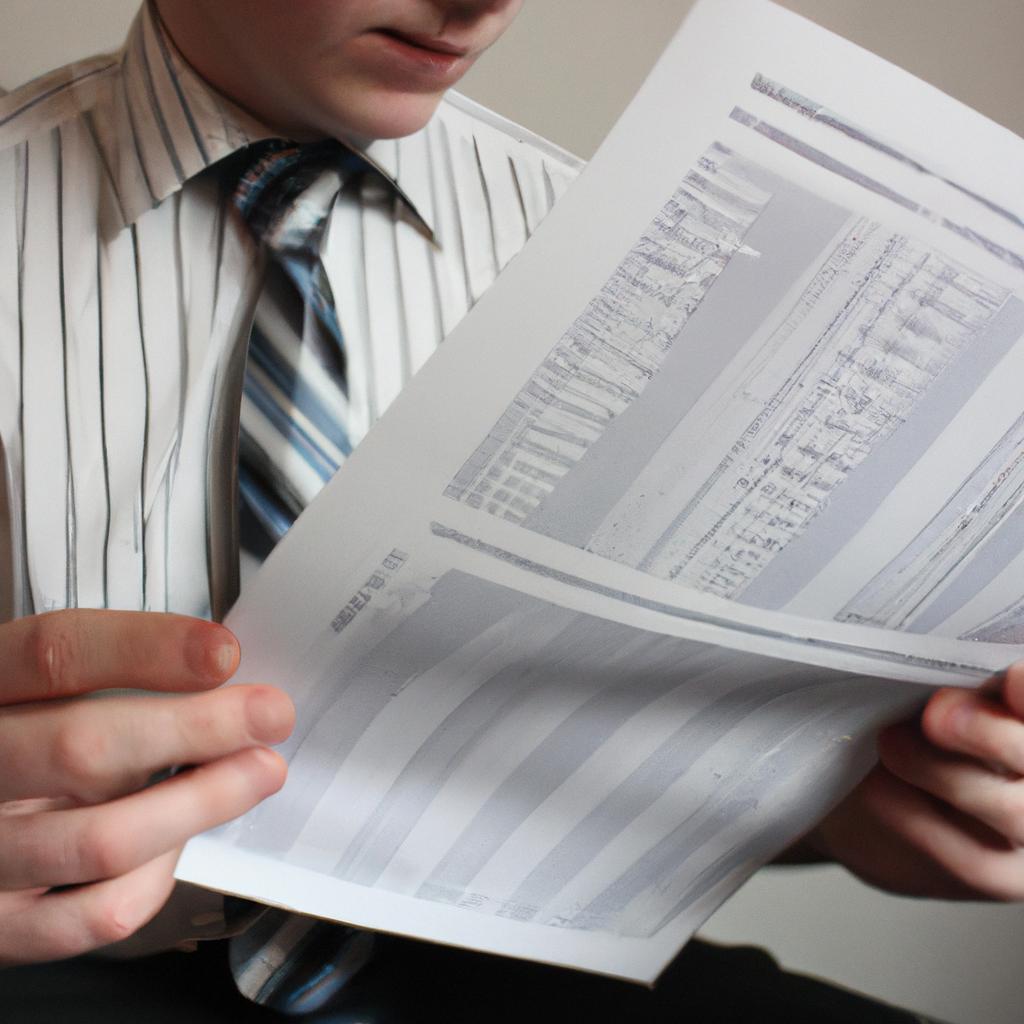 Person reading financial documents attentively